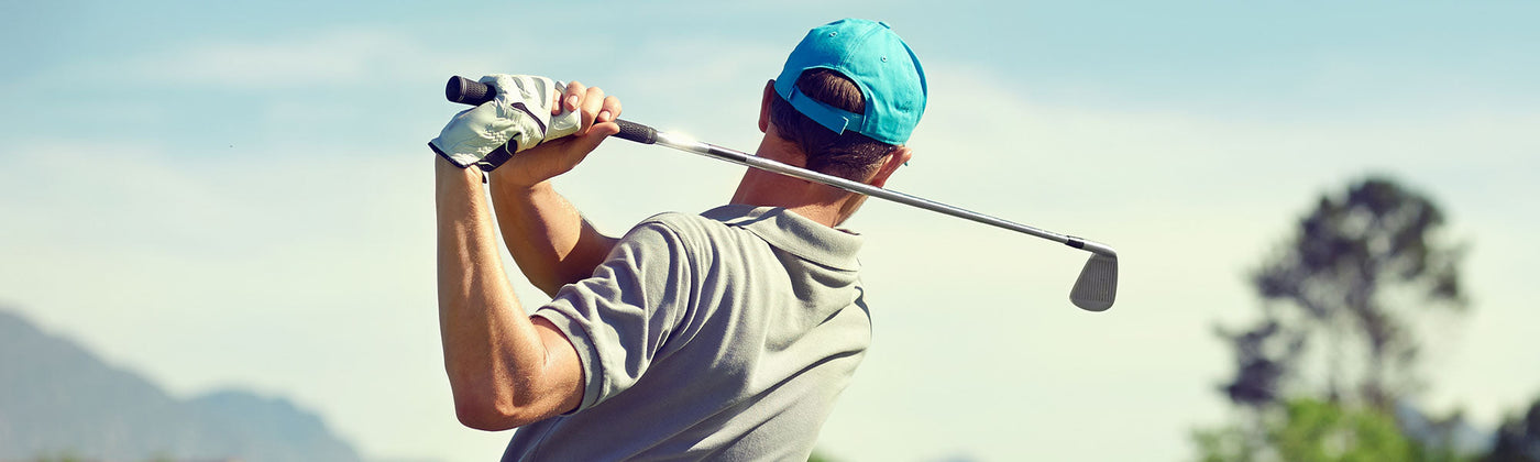 A man playing golf