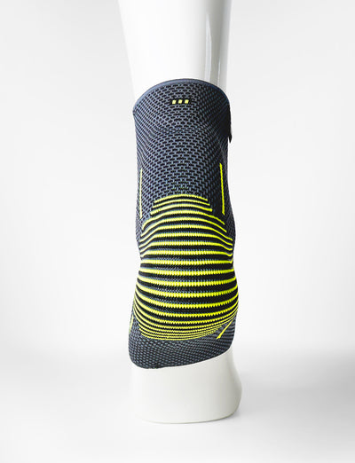 Foot mannequin wearing Neo G Active Plus Ankle Support back view
