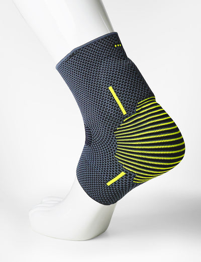 Foot mannequin wearing Neo G Active Plus Ankle Support left side showing integrated premium quality silicone joint cushion