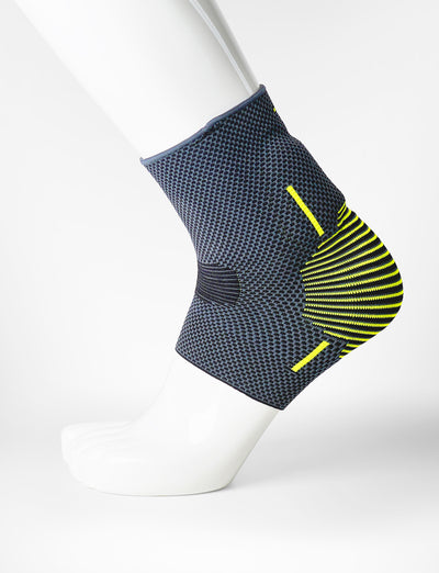 Foot mannequin wearing Neo G Active Plus Ankle Support left side showing integrated premium quality silicone joint cushion