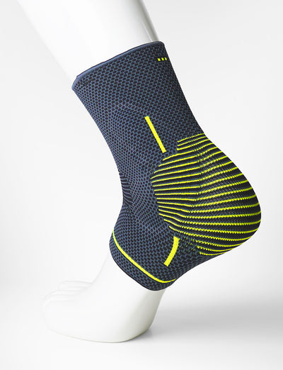 Foot mannequin wearing Neo G Active Plus Ankle Support left side showing integrated premium quality silicone joint cushion