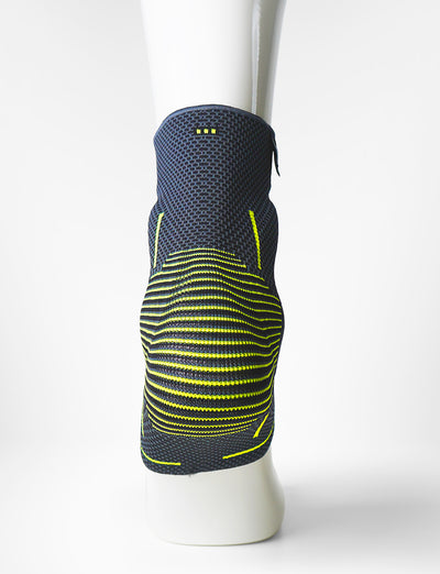 Foot mannequin wearing Neo G Active Plus Ankle Support back view