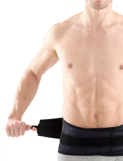Man wearing Neo G Easy-Fit Back Brace, facing front, highlighting the Adjustable variable compression straps