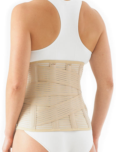 Woman wearing Neo G Lumbosacral Support/Brace facing back on an angle