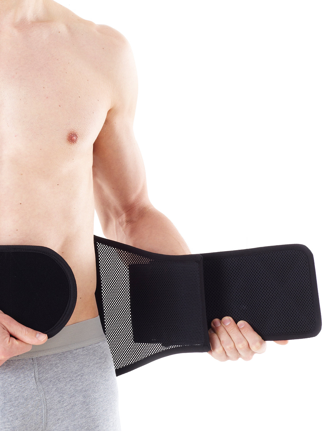 Man putting on Neo G Adjusta-Fit Back Brace facing front