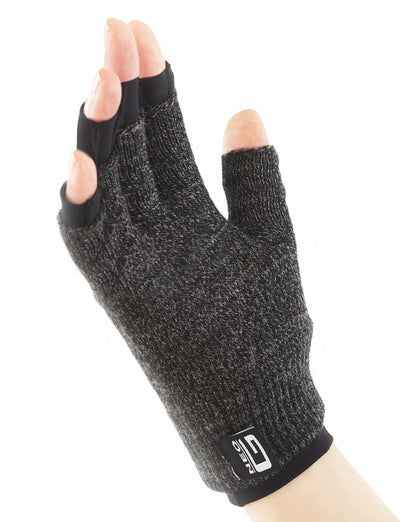Hand wearing Comfort/Relief Arthritis Gloves, palm up