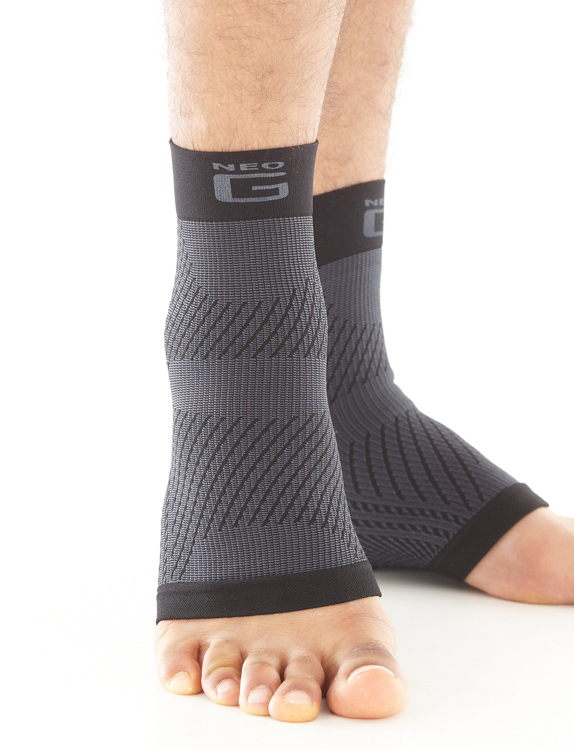 Pair of Feet wearing Neo G Plantar Fasciitis Everyday Support facing front