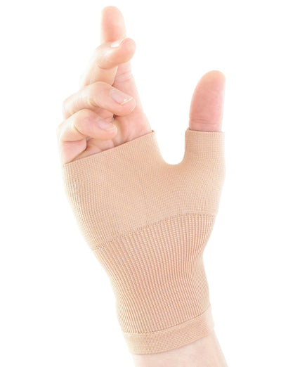 Hand wearing beige Neo G Airflow Wrist & Thumb Support palm up