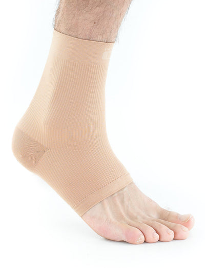 Foot wearing beige Neo G Airflow Ankle Support