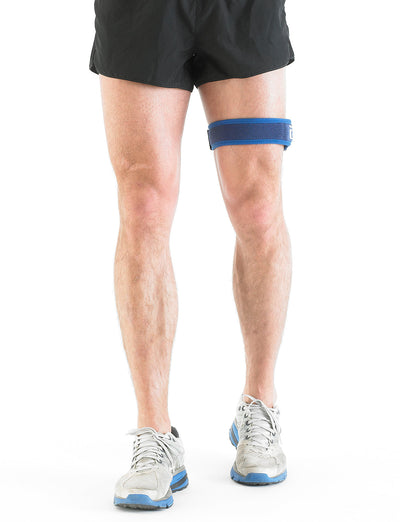Man wearing Neo G ITB Strap on thigh facing front