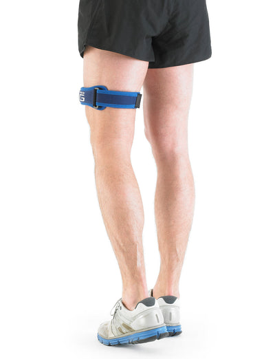 Man wearing Neo G ITB Strap on thigh facing back