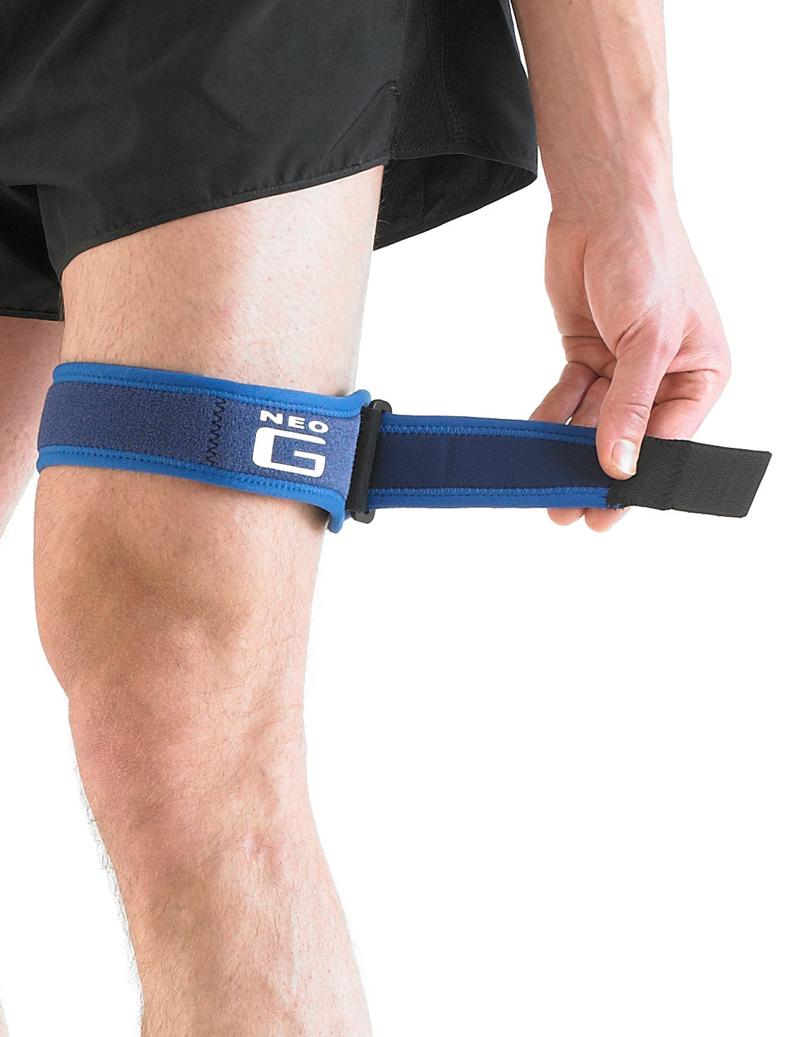 Man wearing Neo G ITB Strap on thigh showing adjustable strap