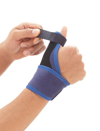 Hand wearing Neo G Easy-Fit Thumb Brace highlighting adjustable thumb strap