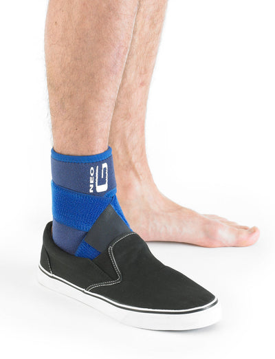 Man wearing Neo G Ankle Support with Figure of 8 Strap under a shoe