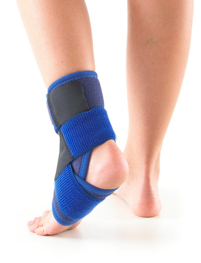 Child wearing Neo G Kids Ankle Support with Figure of 8 Strap, facing back