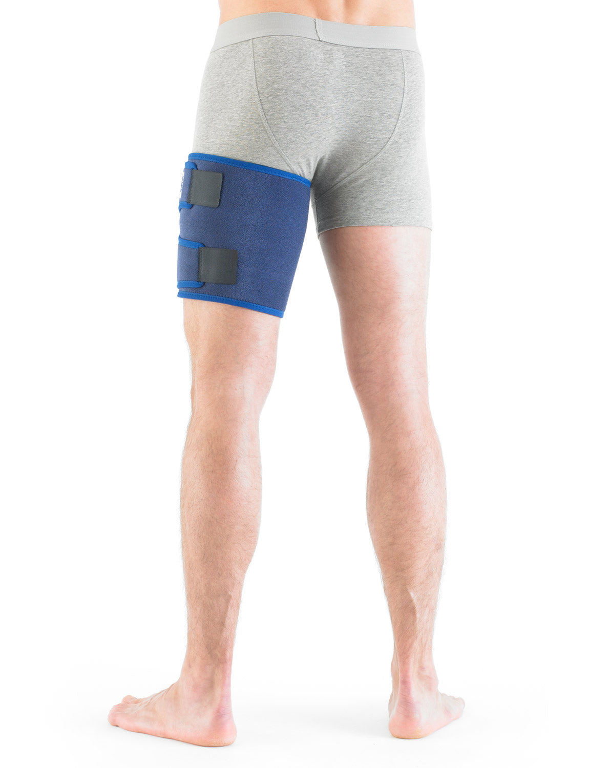 Man wearing Neo G Thigh and Hamstring Support on left leg facing back