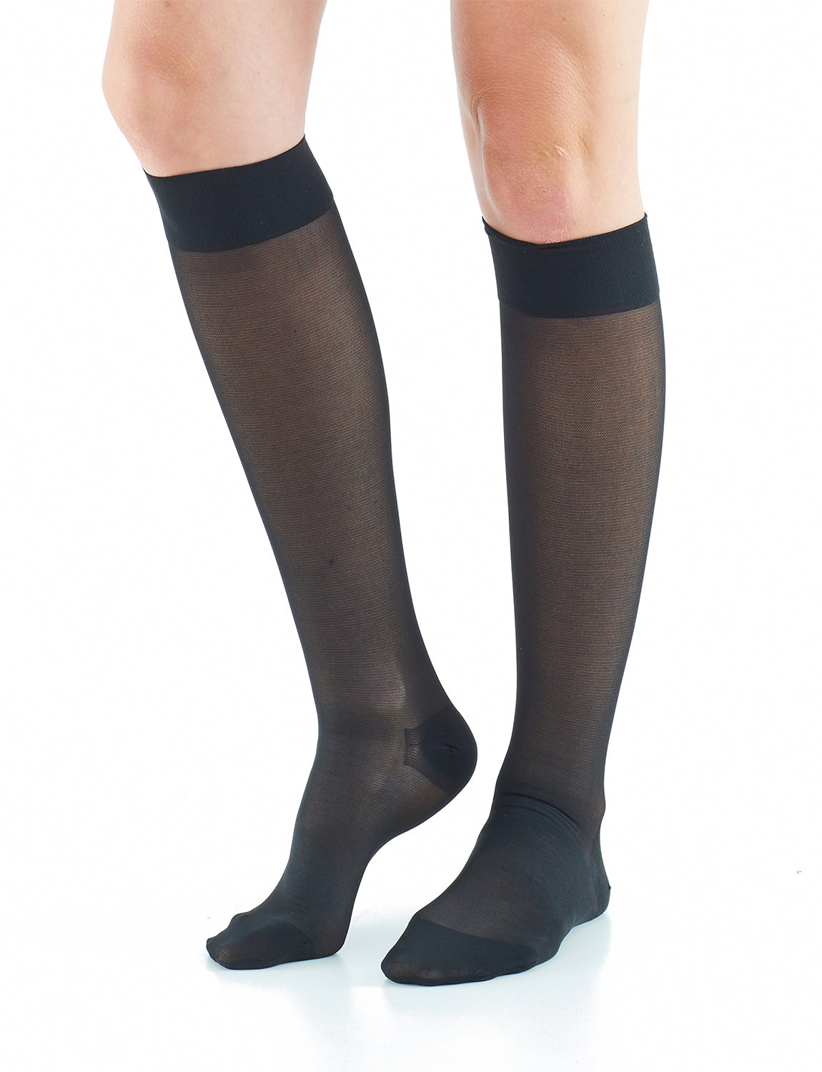 Woman wearing Black Neo G Energizing Trouser Knee Highs showing comfort top band
