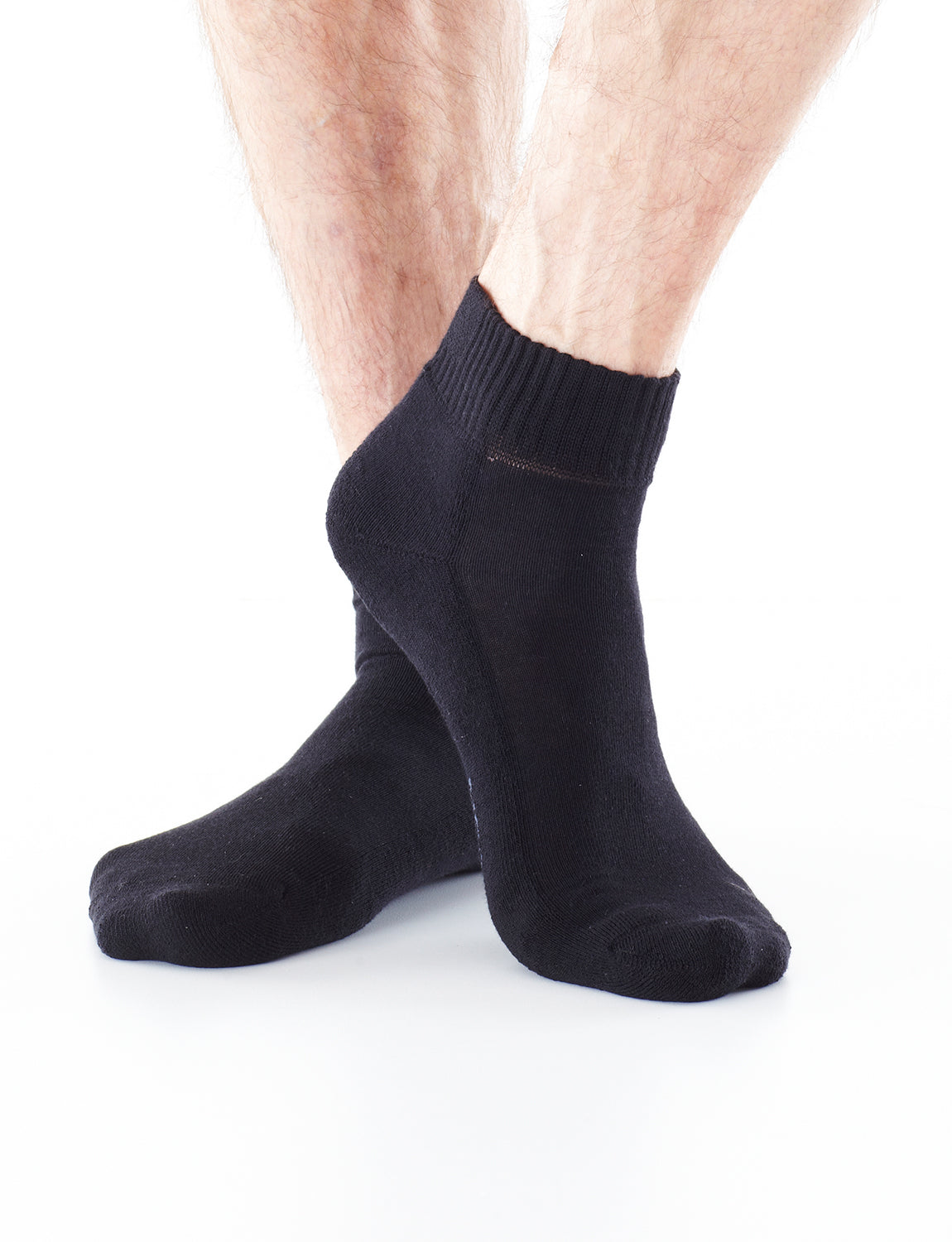 Pair of feet wearing Black Neo G Comfort Socks Diabetic Friendly facing front