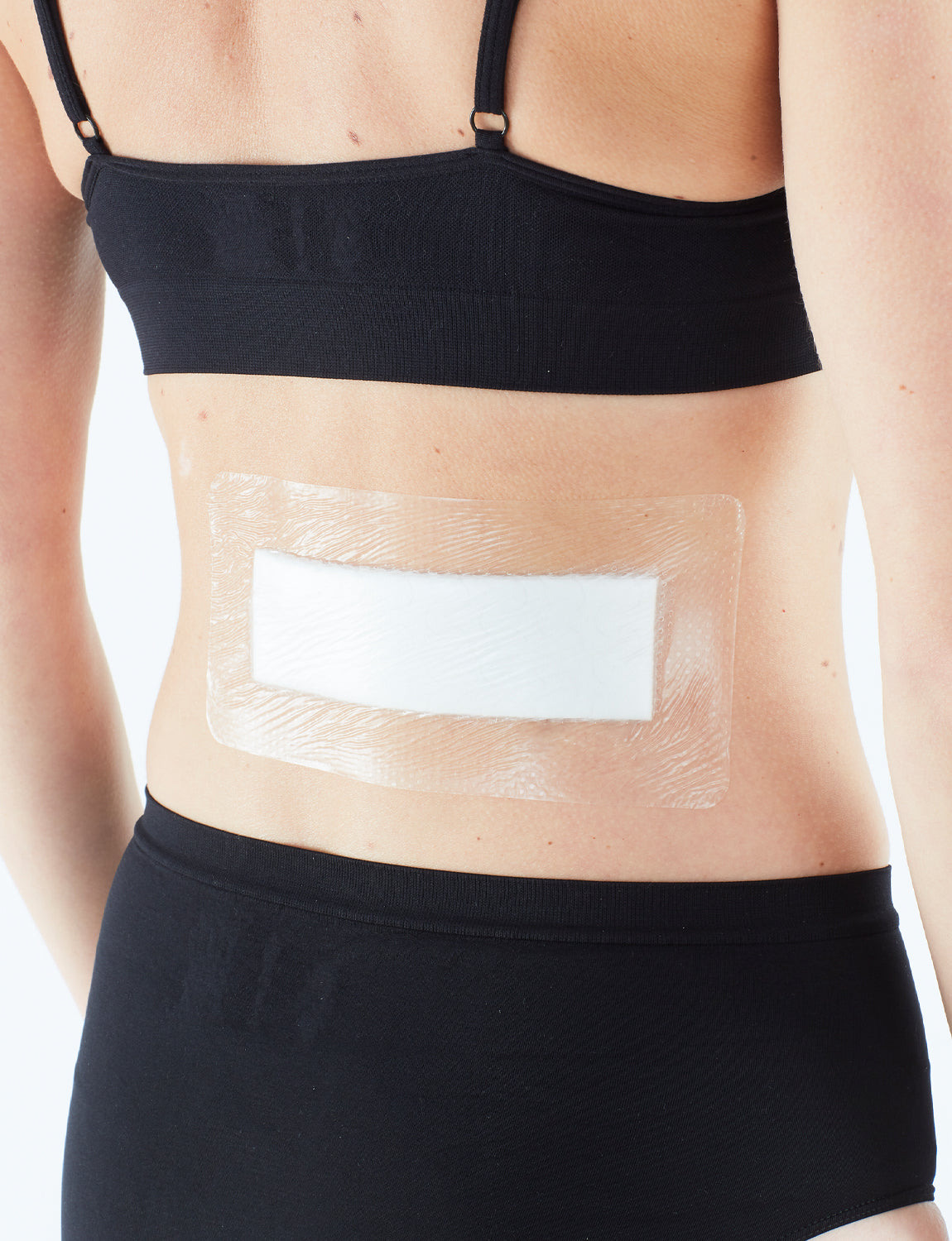 Neo G Silicone Postsurgical Dressing on back