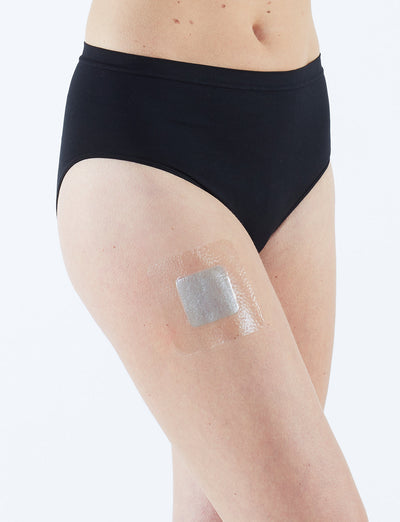 Neo G Hydration Multi Purpose Dressing on leg, featuring translucent pad